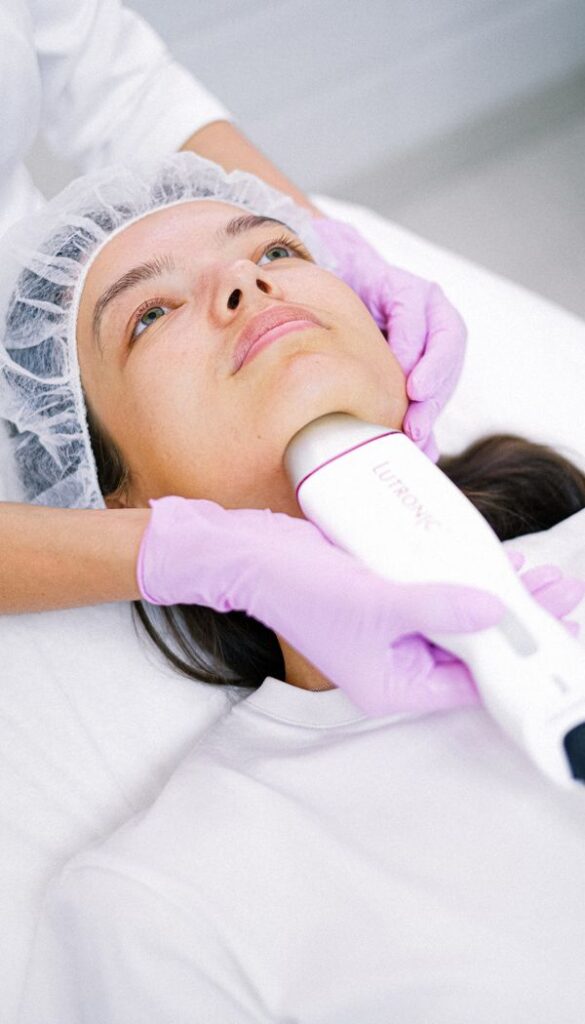 Aesthetician performing a non-surgical HIFU face lift